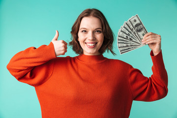 Sticker - Portrait of a happy young woman dressed in sweater