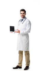 Wall Mural - Doctor in glasses wearing white coat with stethoscope presenting digital tablet isolated on white