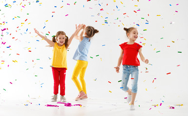 Sticker - happy children on holidays  jumping in multicolored confetti on white