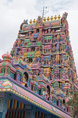 Wall Mural - An entrance tower, at the front of the Karpaga Vinayagar temple at Pillaiyarpatti in Tamil Nadu. It was only during the last century that temple authorities began to paint gateways