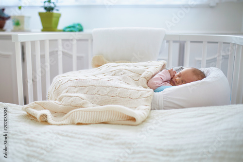 baby bed attached to parents