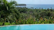 Tropical Pool With Caribbean View Of A Close Island