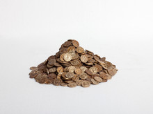 Pile Of Replica Gold Coins On White Background