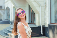 Teen Girl With Heart-shaped Sunglasses Smiling