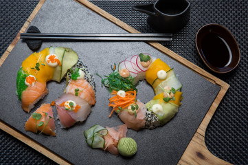 Wall Mural - Different types of sushi set. Various sushi on plate