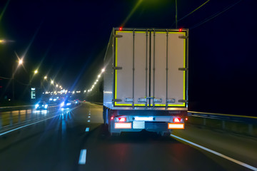 Wall Mural - truck moves on highway at night