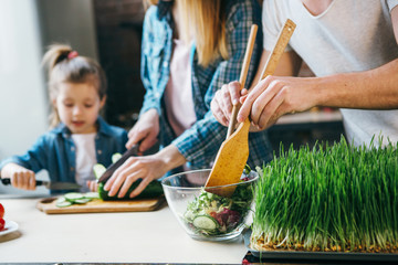 Wall Mural - Family cook together in the kitchen.