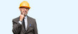 © Krakenimages.com - Senior architect or engineer thinking and looking up expressing doubt and wonder isolated over blue background