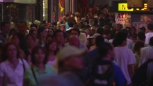 A Shoulder-to Shoulder Crowd In Times Square On A Summer Evening
