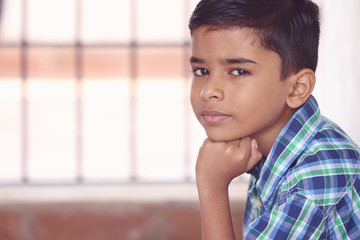 Wall Mural -     Portrait of Indian Little boy Posing to Camera with Expression 