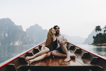 Couple boating on a quiet lake