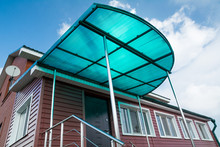 Polycarbonate Canopy On The Porch Of The House