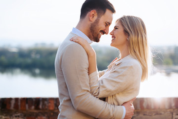 Wall Mural - Happy couple smiling and dating outdoor