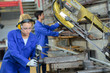 © auremar - woman machine technician
