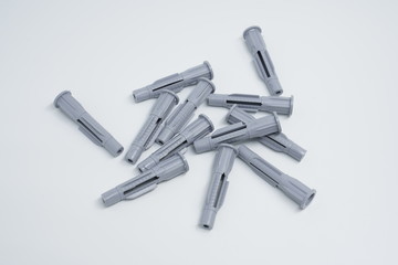 Dowels and screws on a white background