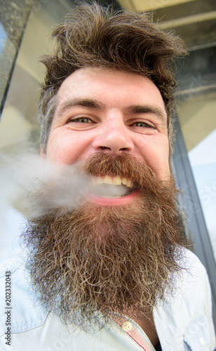 Hipster With Tousled Hair And Gray On Relaxed Cheerful Face With