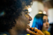 © ZoneCreative - Afro american man smiling.Group of multiethnic people having business team meeting in restaurant lounge.Teamwork,corporate,diversity and social concepts.