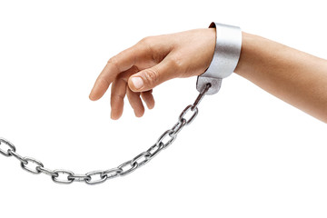 Man's hand in chains isolated on white background. Close up, concept against violence