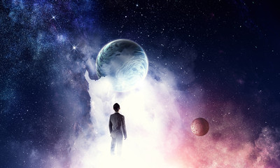 Wall Mural - businessman and cosmos concept