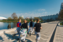Minsk, Belarus - 21 April 2018. A Group Of Teenagers Make A Morning Run Through The City, A Healthy Lifestyle, Sports.