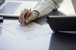 © PhotoAlto - Man working with blueprints