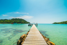Wooden Pier Or Bridge With Tropical Beach And Sea In Paradise Island
