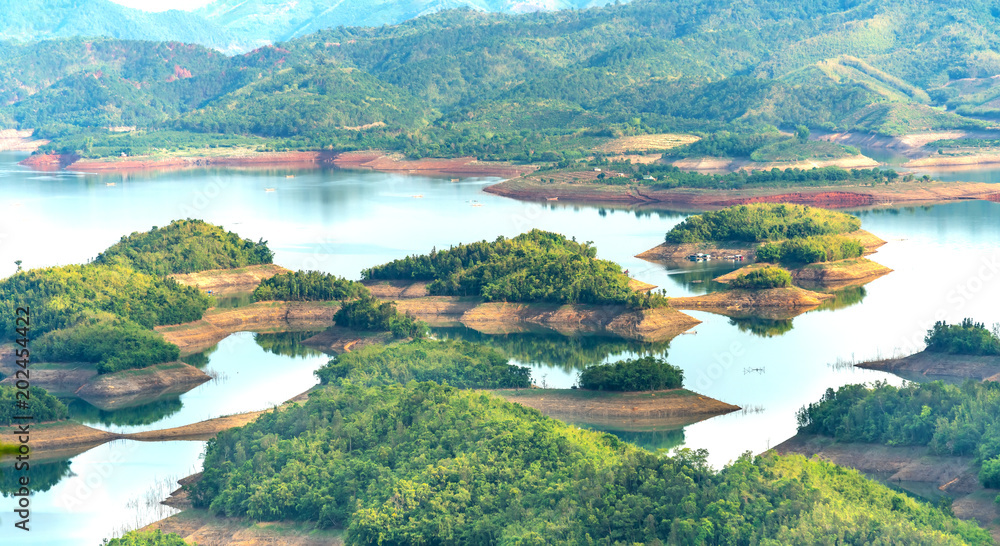 Ta Dung lake in the summer afternoon when the sun shines down on the lake  and