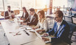 © Vasyl - Group of people working in modern office