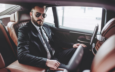 Wall Mural - Businessman in car