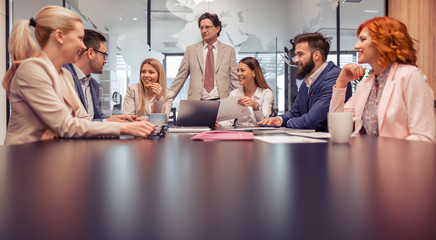 Happy smiling business team in office