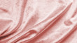 Rose gold pink velvet background or velour flannel texture made of cotton or wool with soft fluffy velvety satin fabric cloth metallic color material