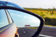 © dmf87 - Landscape in sideview mirror of road and cars