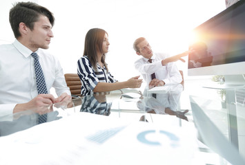 Canvas Print - business team discussing sales statistics