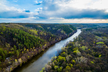 River Flowing In The Forest. Aerial View Landscape. Shooting From A Drone
