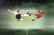 © vectorfusionart - Football players tackling for the ball against football pitch under green sky
