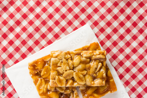 Fotografie, Tablou Candy with peanut: Pe de Moleque in Brazil and Chikki in India