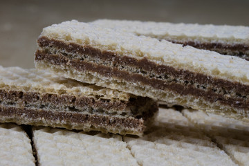 Wall Mural - Tasty chocolate wafers. Sweet dessert cookies on a wooden kitchen table.