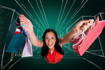 Woman standing with shopping bags against green background with vignette