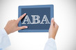 The word aba against doctor using tablet pc 