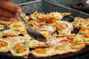 Poster - Fried seafood crispy with omelet is delicious