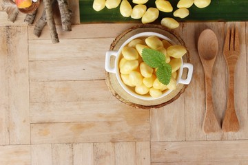 Canvas Print - boiled ginkgo nuts delicious on wood background