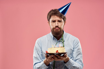 Wall Mural - man in hat with cake