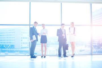 Wall Mural - Group of business people doing presentation with laptop during meeting. Group of business people