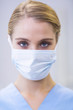 © WavebreakmediaMicro - Portrait of female nurse wearing surgical mask