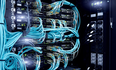 Wall Mural - MOSCOW, RUSSIA - April 27: Fibre Channel swich. Severs computer in a rack at the large data center.  Fiber Optical connector interface. Editorial