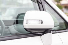 Close-up White Car Side Mirror
