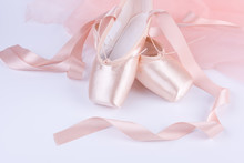 Closeup Of Ballet Shoes With Pink Ballet Costume