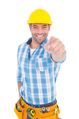 Poster - Portrait of smiling handyman pointing at you