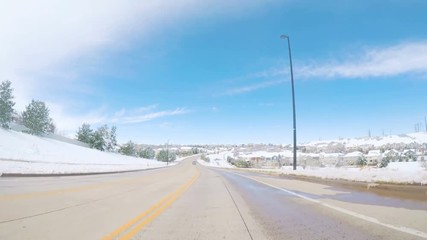 Wall Mural - Denver, Colorado, USA-March 27, 2018-POV-Driving on suburban road after the Sping snow storm