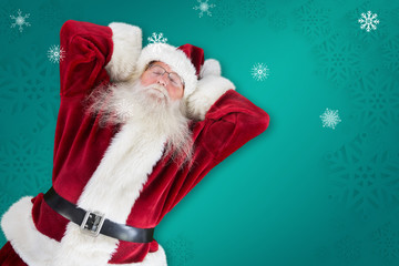 Wall Mural - Sleeping santa against green snowflake background